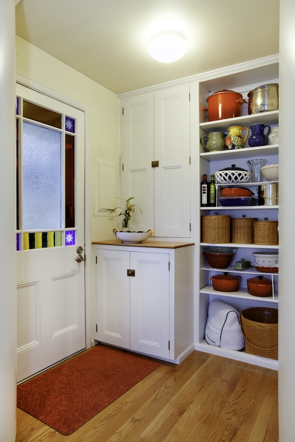 You may have a kitchen pantry design that is walk-in. Or your pantry space may be a wall of kitchen cabinets. If you're really lucky you may even have a butler's pantry. Whatever you've got, to get the most out of the space you need the best kitchen pantry design ideas out there. We even have pantry designs for small spaces!