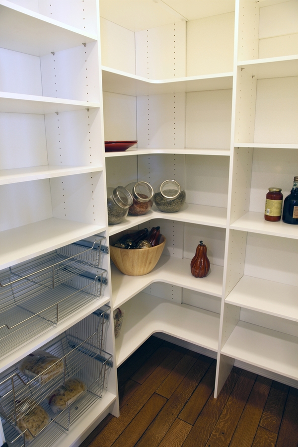You may have a kitchen pantry design that is walk-in. Or your pantry space may be a wall of kitchen cabinets. If you're really lucky you may even have a butler's pantry. Whatever you've got, to get the most out of the space you need the best kitchen pantry design ideas out there. Corner shelves really help you make the most of your pantry.